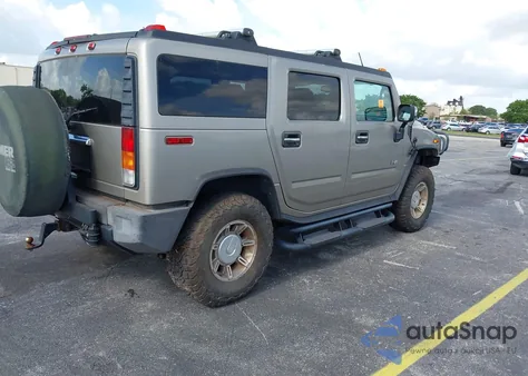 2003 Hummer H2 z USA, uszkodzony, nr VIN 5GRGN23U63H131139
